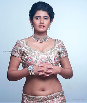 Ashima Narwal in an embroidered pink and gold lehenga choli with pearl jewelry HD phone wallpaper