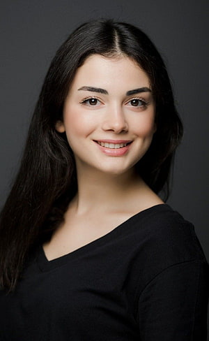 Özge Yağız Professional Portrait with Dark Hair and Black Top HD phone wallpaper