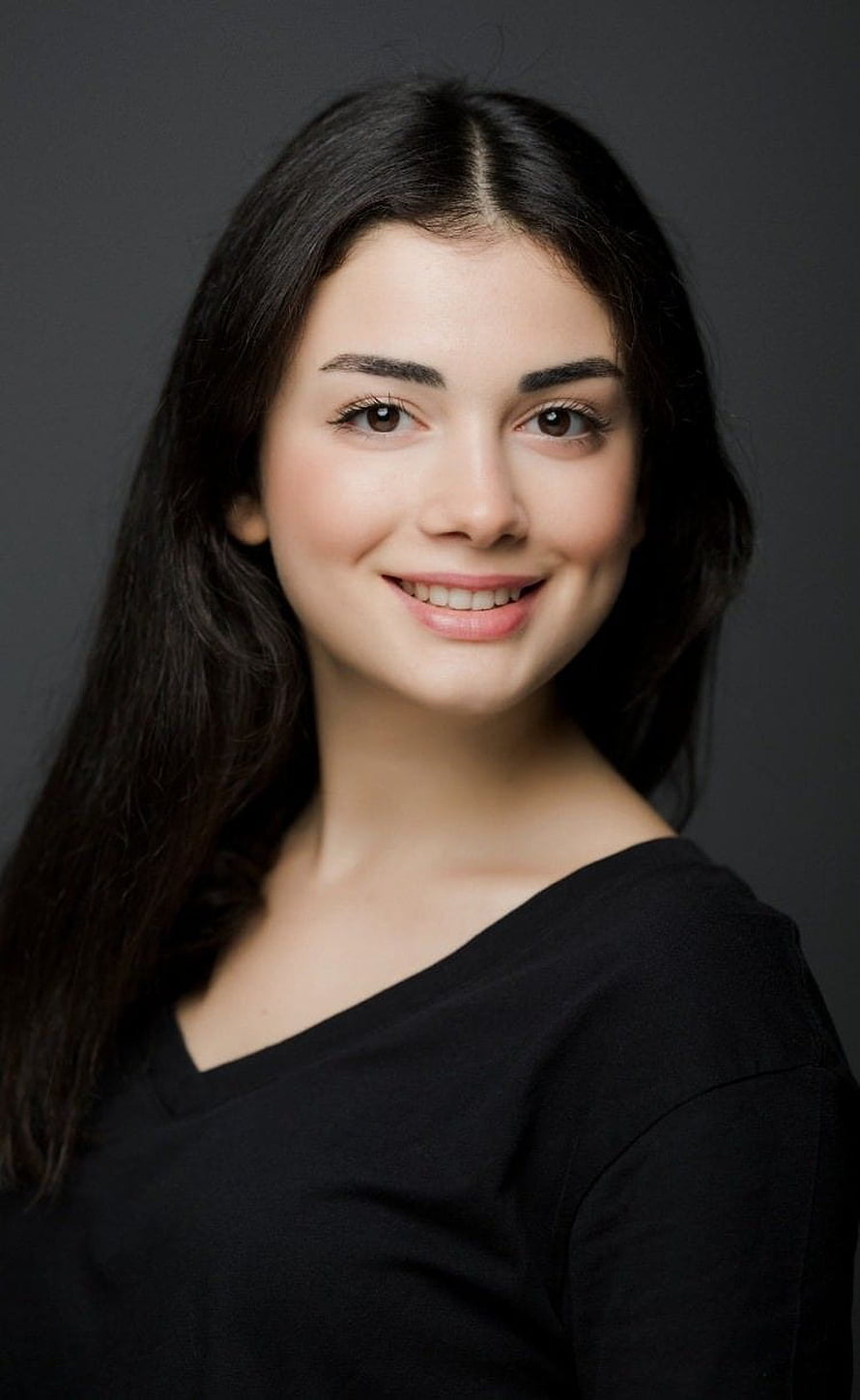Özge Yağız Professional Portrait with Dark Hair and Black Top HD phone wallpaper