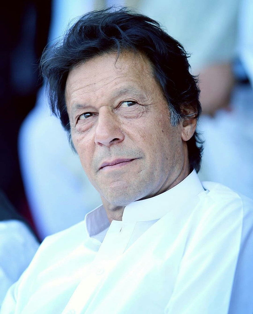 Imran Khan in a White Collared Shirt with a Serious Expression HD phone wallpaper