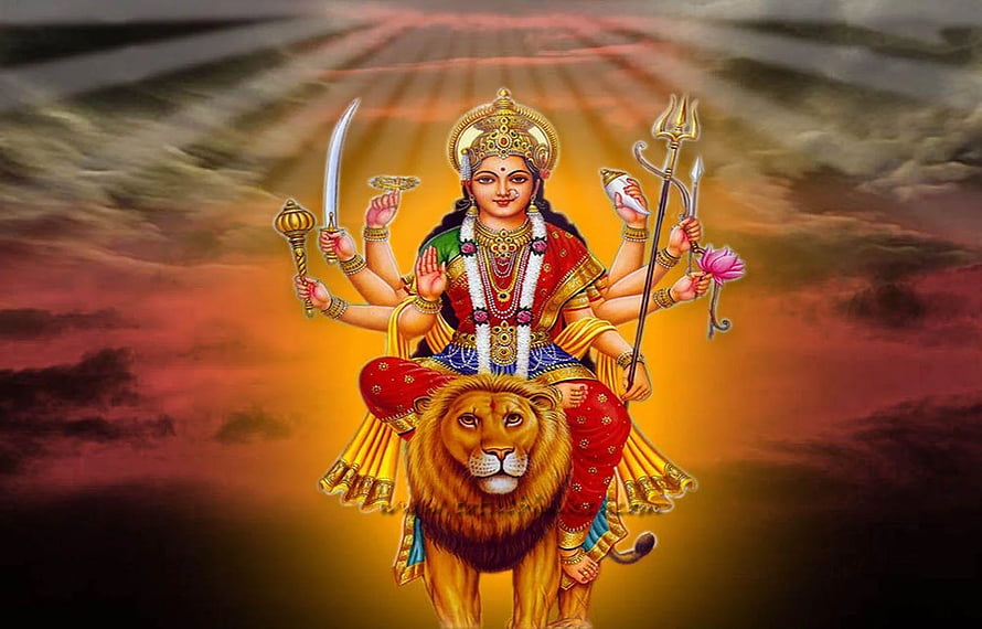 Maa Durga Riding a Lion with Multiple Arms Holding Sacred Weapons and Lotus HD wallpaper