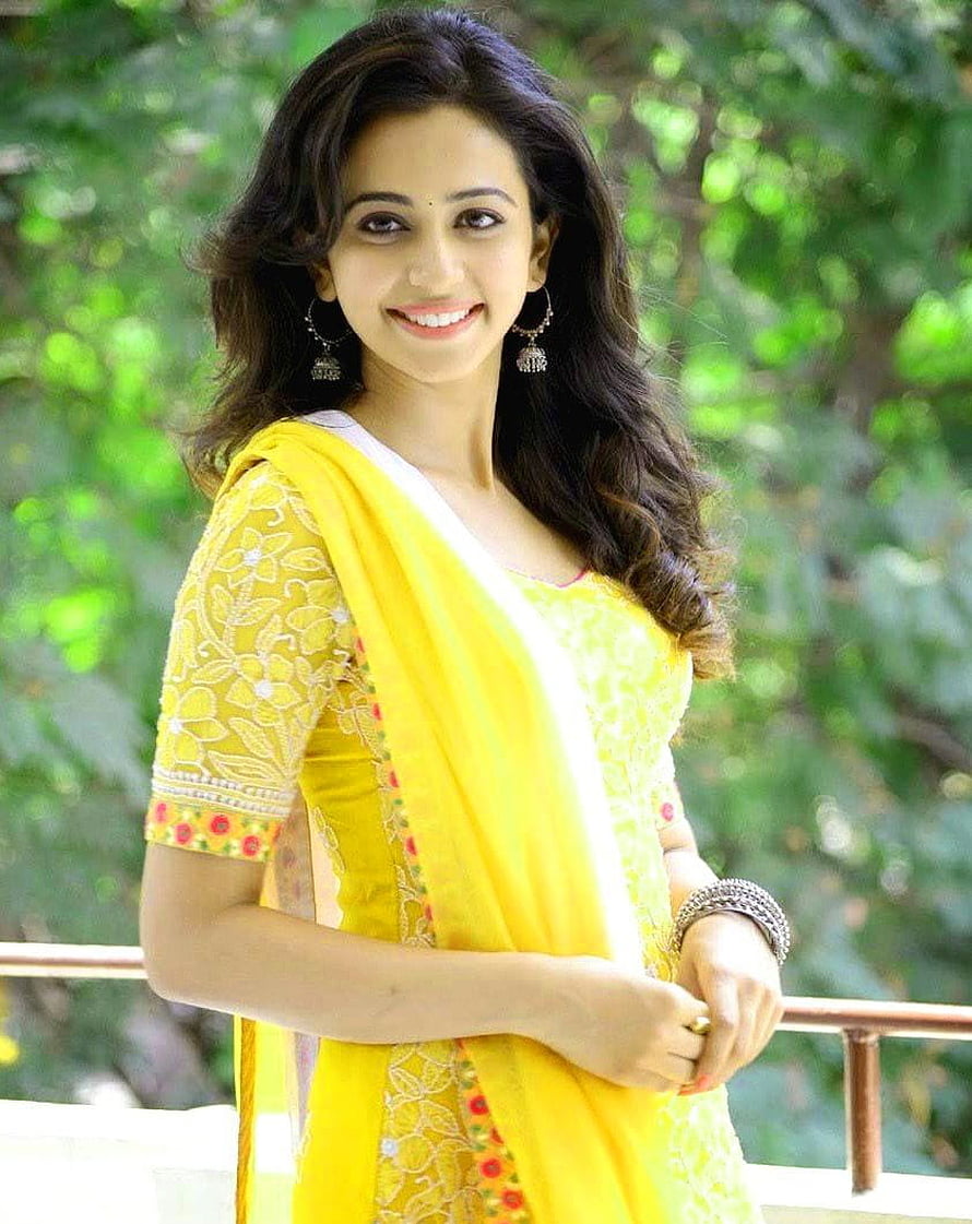 Smiling Indian Woman in Vibrant Yellow Saree with Floral Embroidery and Traditional Jewelry HD phone wallpaper