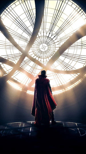 Doctor Strange Standing Beneath a Glowing Geometric Dome in Cinematic Light HD phone wallpaper