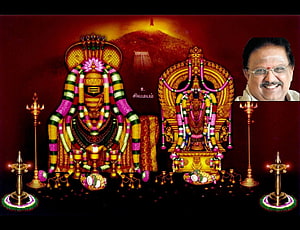 Annamalaiyar Temple Deity with Traditional Garlands and Oil Lamps HD wallpaper