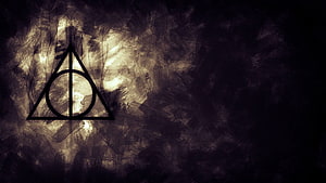 Harry Potter Deathly Hallows Symbol on Dark Textured Background HD wallpaper