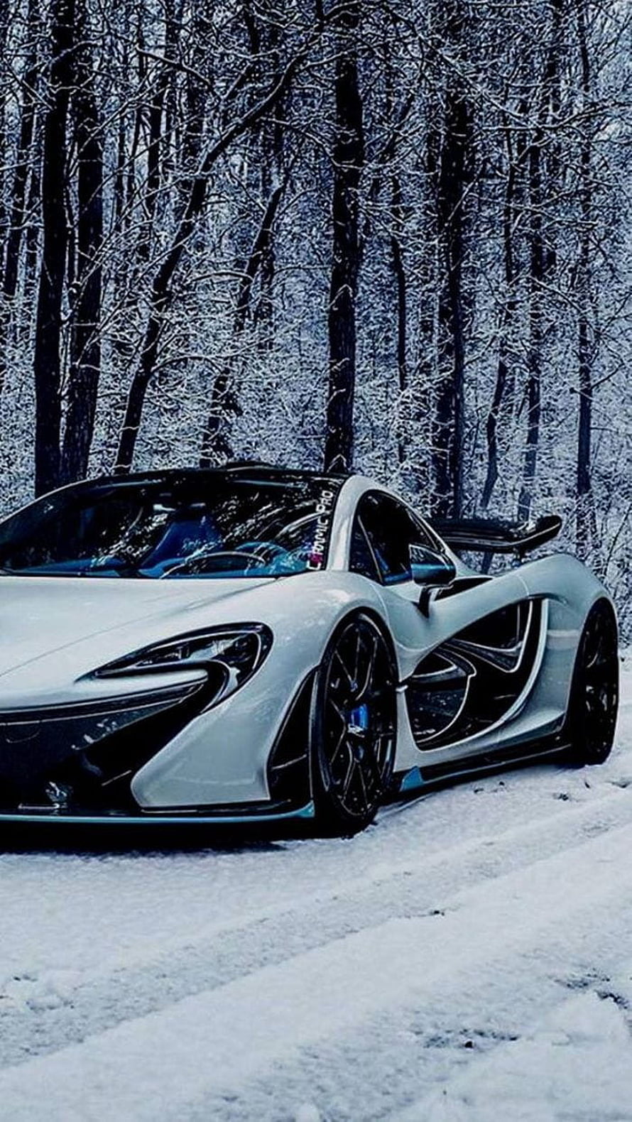 White McLaren P1 Super Car Parked in Snowy Forest HD phone wallpaper