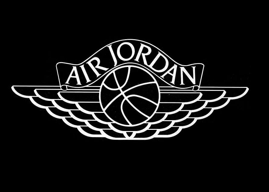 Air Jordan Wings Logo with Basketball Emblem on Black Background HD wallpaper