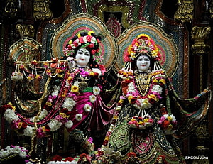 ISKCON Juhu Sringar Deity Darshan with Ornate Floral Garlands and Traditional Attire HD wallpaper