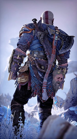 Kratos from God of War standing in a frost-covered landscape with axe and shield HD phone wallpaper