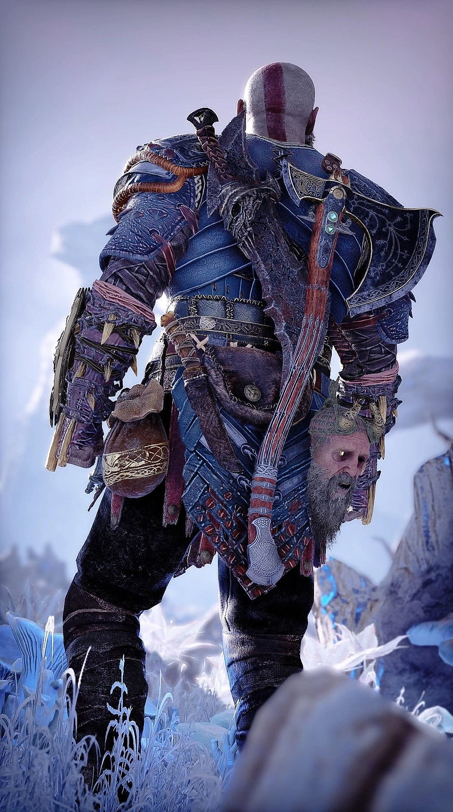 Kratos from God of War standing in a frost-covered landscape with axe and shield HD phone wallpaper