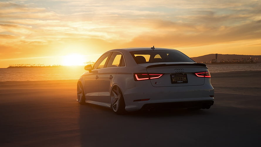 White Audi S3 Sedan Parked on Beach at Golden Hour Sunset HD wallpaper