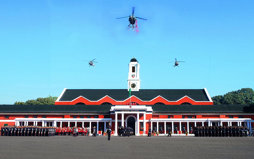 Indian Military Academy Dehradun with helicopter flyover and ceremonial guard HD wallpaper