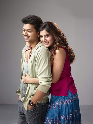 Vijay and Samantha in a warm studio portrait from a Telugu film HD phone wallpaper