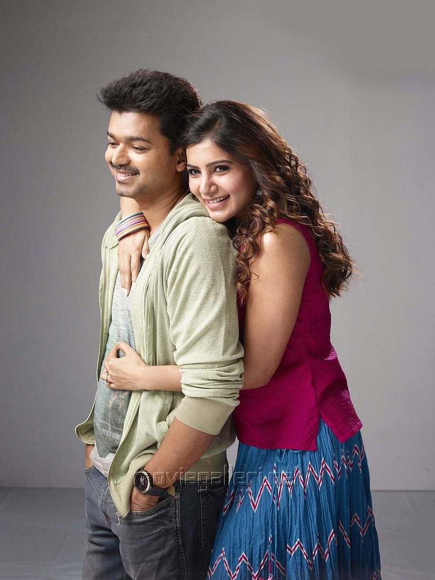 Vijay and Samantha in a warm studio portrait from a Telugu film HD phone wallpaper