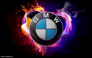 BMW Logo Surrounded by Vibrant Neon Flames and Smoke on a Dark Background HD wallpaper