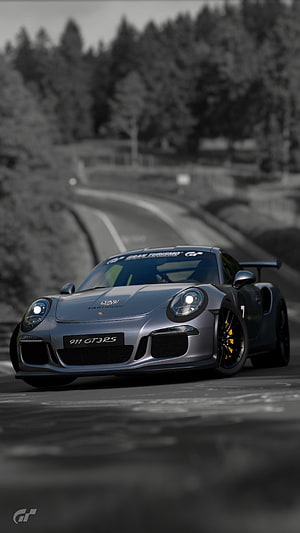 Porsche 911 GT3 RS on a winding forest road in a cinematic monochrome style HD phone wallpaper