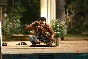Karthi in Kaithi Movie Scene Eating While Handcuffed on Stone Floor HD wallpaper
