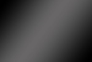 Dark Charcoal Gradient with Soft Radial Light and Minimalist Texture HD wallpaper
