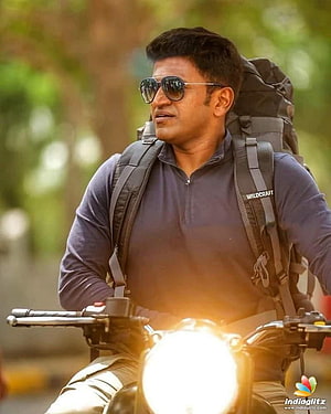 Puneeth Rajkumar Riding Motorcycle With Backpack And Sunglasses HD phone wallpaper