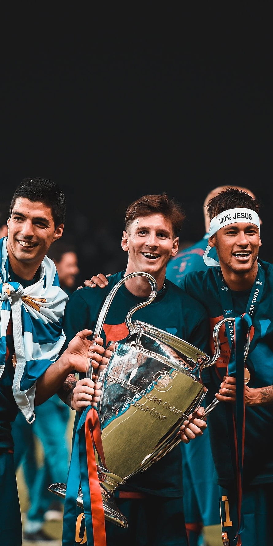 Lionel Messi and Luis Suarez celebrate with the UEFA Champions League trophy HD phone wallpaper