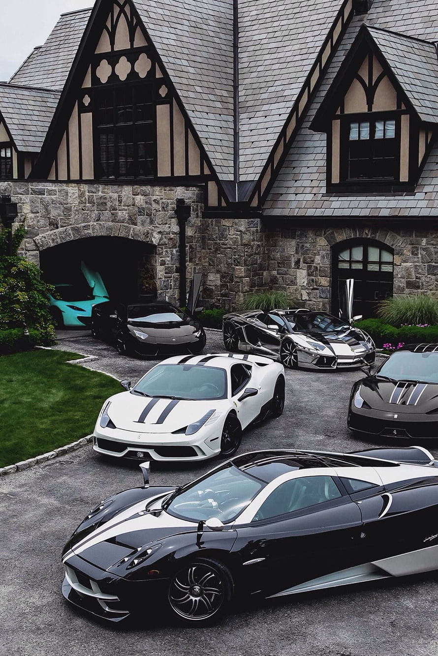 Exotic Supercar Collection Parked in Front of a Grand Tudor-Style Stone Mansion HD phone wallpaper
