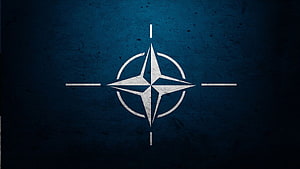 NATO Four-Pointed Star Emblem on Dark Textured Blue Background HD wallpaper