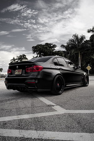Matte Black BMW M3 F80 Competition Sedan with Custom Wheels in Parking Lot HD phone wallpaper
