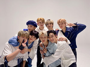 Stray Kids Group Photo in White and Blue Studio Setting HD wallpaper