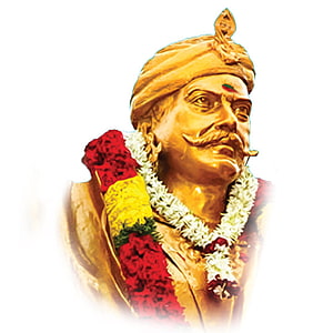 Dheeran Chinnamalai Golden Statue Portrait with Traditional Turban and Floral Garland HD phone wallpaper