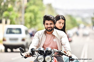 Vijay Deverakonda and Rashmika Mandanna riding a motorcycle in Geetha Govindam HD wallpaper