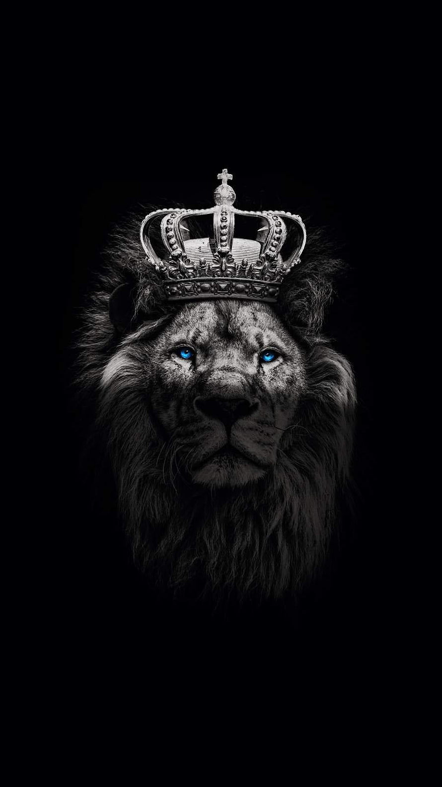 Majestic Lion King Wearing a Royal Crown with Glowing Blue Eyes on Black Background HD phone wallpaper