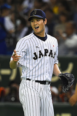 Shohei Ohtani in Japan National Team Pinstripe Uniform on the Baseball Field HD phone wallpaper