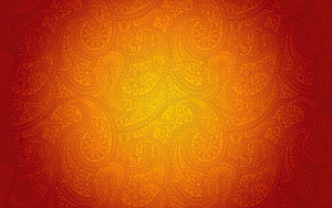 Vibrant Orange Paisley Pattern with Floral Motifs and Warm Gradient Background HD wallpaper