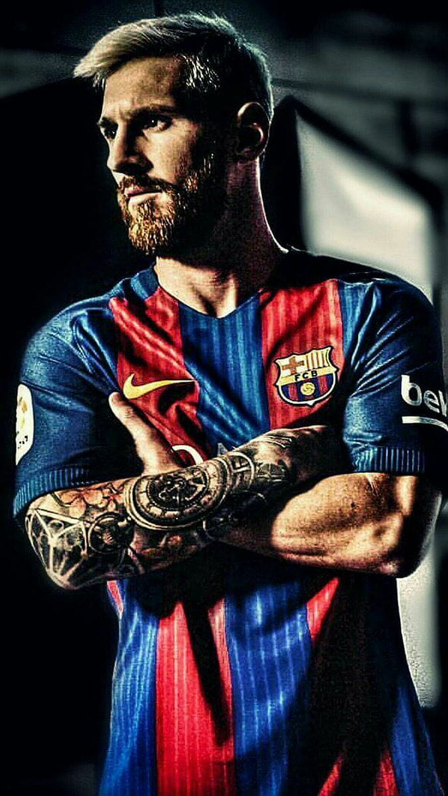 Lionel Messi in FC Barcelona Home Kit with Crossed Arms and Tattoos HD phone wallpaper