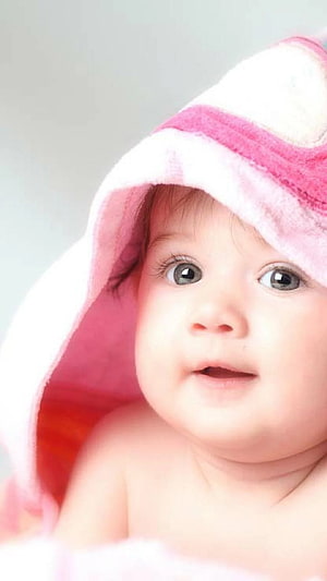 Adorable Baby Girl Wearing Soft Pink Hooded Towel With Wide Eyes HD phone wallpaper