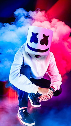 Marshmello DJ in White Hoodie Crouching in Neon Blue and Pink Smoke HD phone wallpaper