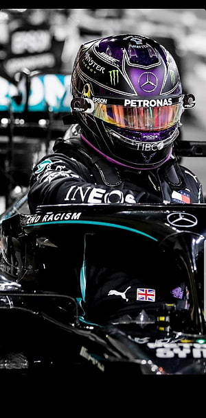 Lewis Hamilton in Mercedes Petronas F1 Helmet and Racing Suit HD phone wallpaper