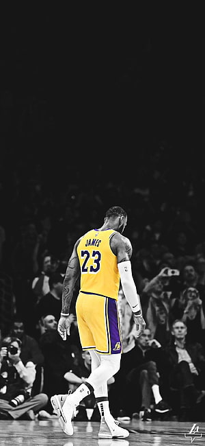 LeBron James in Lakers Jersey Walking on Court with Selective Color Effect HD phone wallpaper