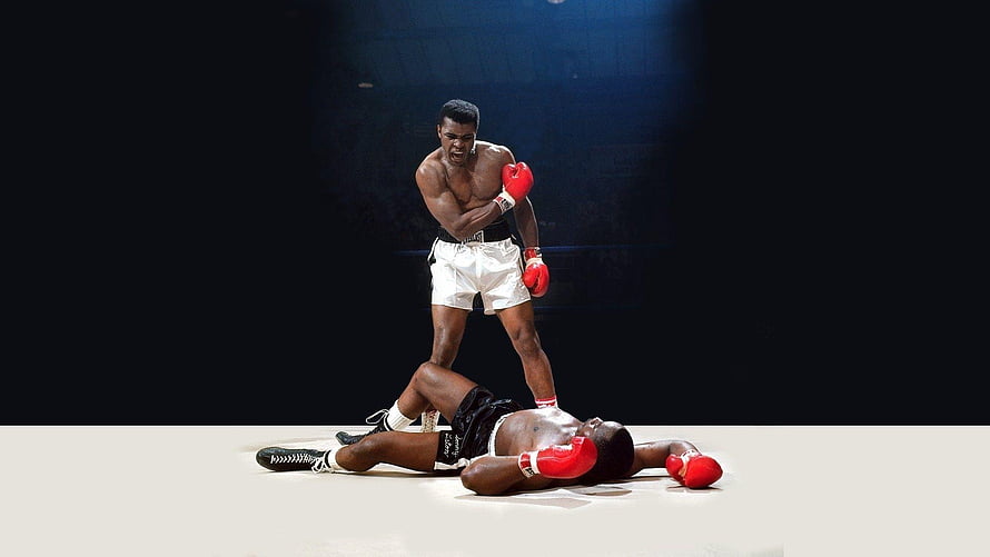 Muhammad Ali Standing Over Knocked Out Opponent in Boxing Ring HD wallpaper