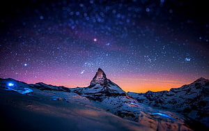 Matterhorn Peak Under a Starry Night Sky with Aurora and Snowy Alpine Landscape HD wallpaper