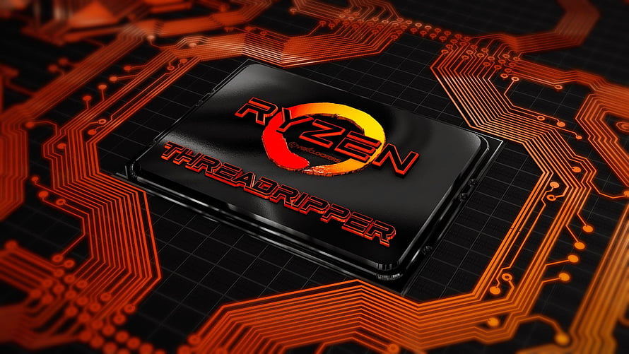 AMD Ryzen Threadripper Processor on Glowing Orange Circuit Board HD wallpaper