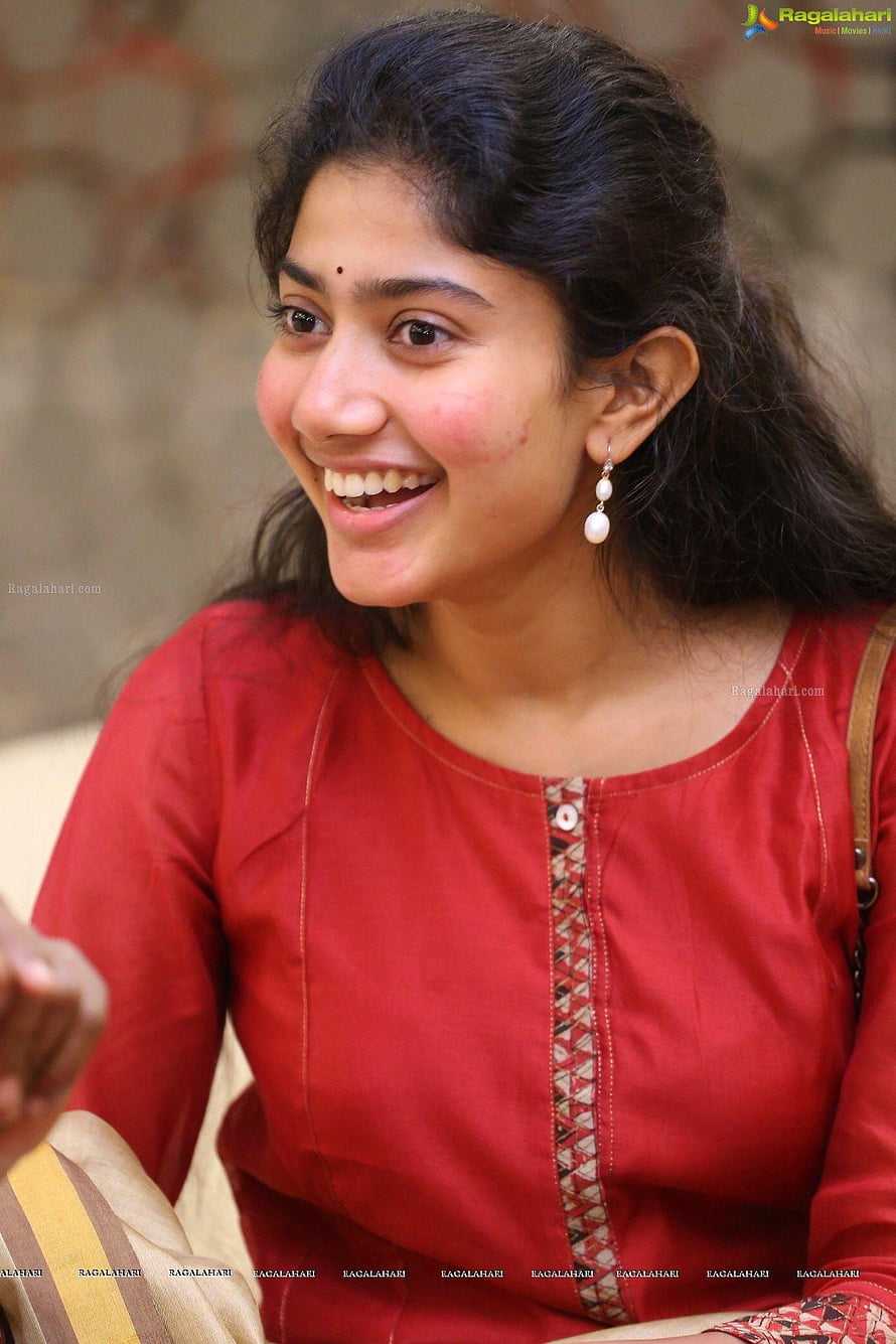 Sai Pallavi Smiling in Red Traditional Top with Pearl Earrings HD phone wallpaper