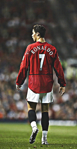 Cristiano Ronaldo Walking on the Pitch in Manchester United Red Kit HD phone wallpaper