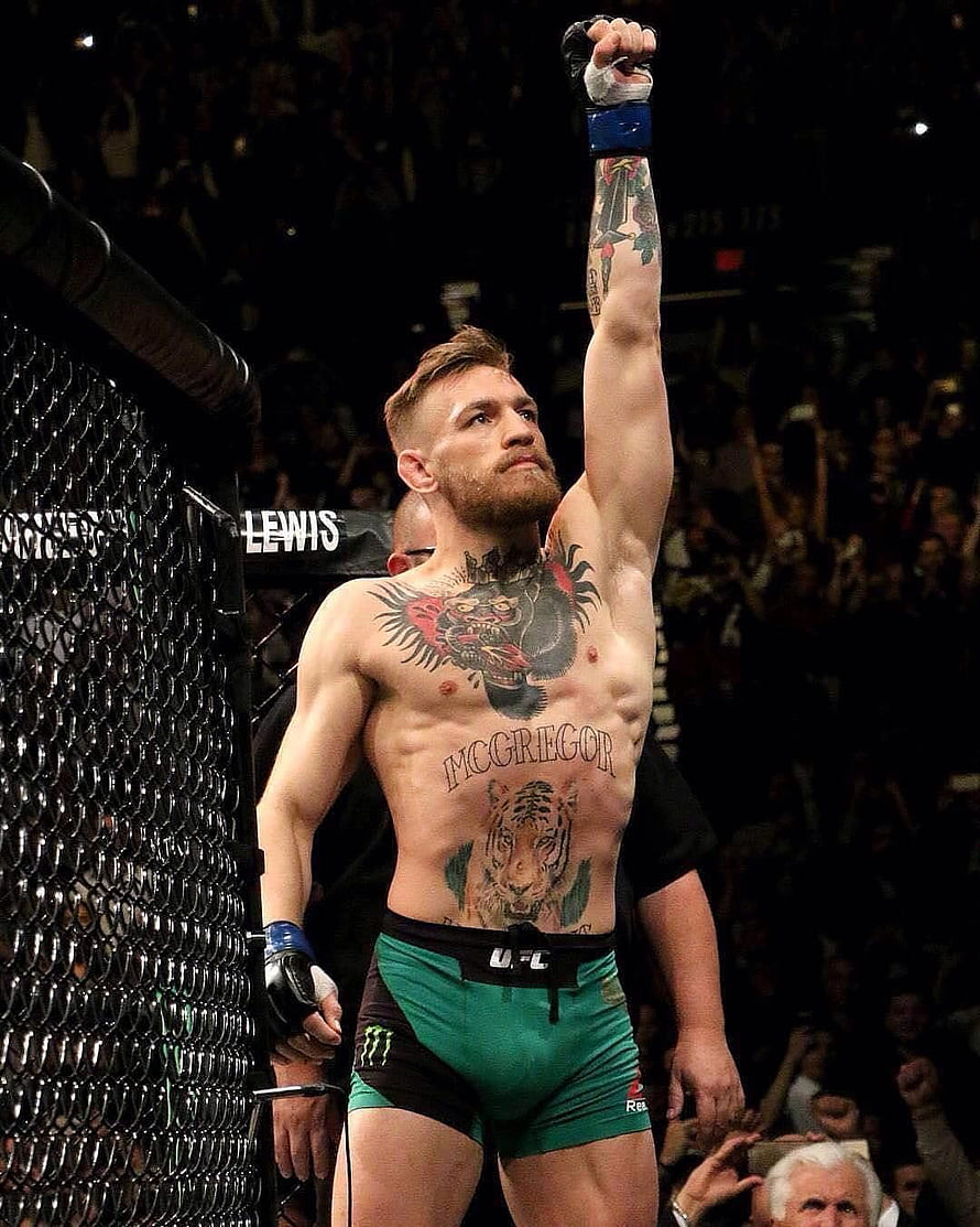 Conor McGregor Celebrates Victory Inside UFC Octagon After UFC 246 Fight HD phone wallpaper