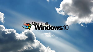 Microsoft Windows 10 Logo Against Blue Sky With Fluffy White Clouds HD wallpaper