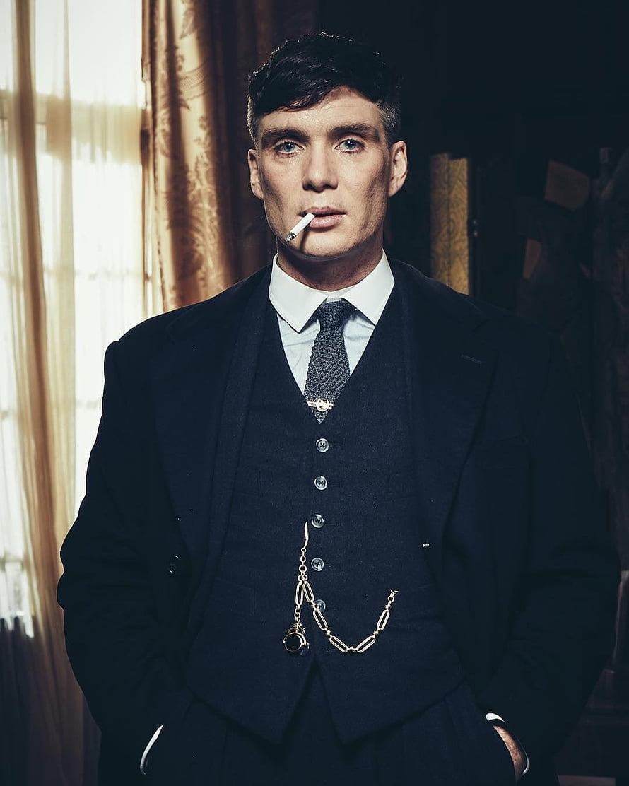 Cillian Murphy as Thomas Shelby in a formal three-piece suit with a cigarette HD phone wallpaper