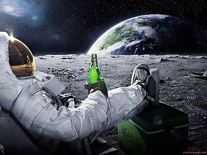 Astronaut relaxing on the lunar surface with a green beer bottle and Earth in the background HD wallpaper