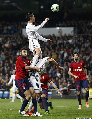 Cristiano Ronaldo Aerial Header During La Liga Match Against Sevilla HD phone wallpaper