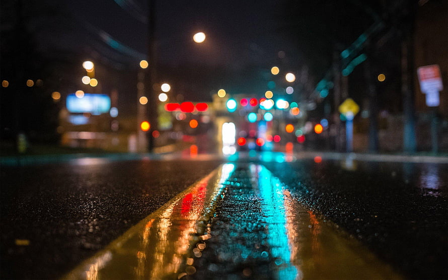 Rainy Urban Street at Night with Colorful Bokeh Light Reflections on Wet Asphalt HD wallpaper