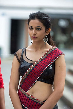 Rakul Preet Singh in a red and black patterned sari with sequined blouse and traditional earrings HD phone wallpaper